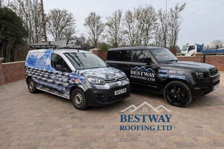 Bestway Roofing LTD branded company vans parked on a driveway, showcasing professional roofing services vehicles with logos and contact details visible