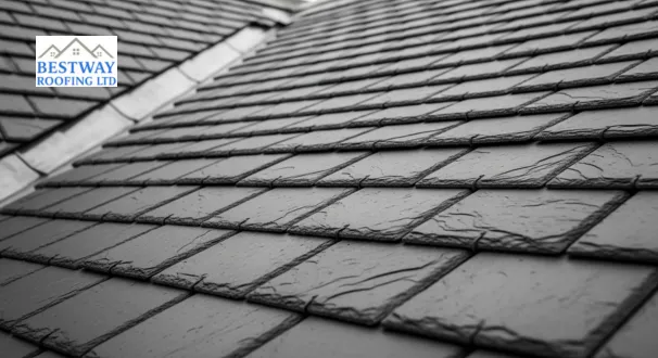 A close-up of a high-quality natural slate roof, showcasing its traditional aesthetic and incredibly long-lasting lifespan for premium properties.
