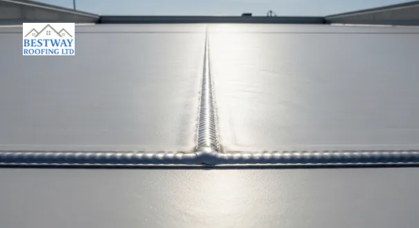 Energy-efficient light grey TPO membrane with heat-welded seams, representing high-performance Flat Roof Materials for modern properties.
